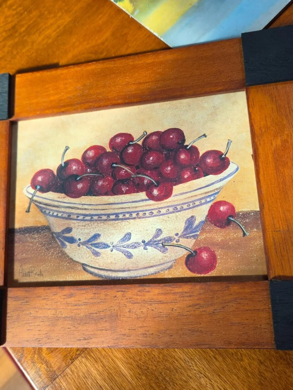 LIFE IS A BOWL OF CHERRIES BY ABBOT READE IS IN AWOOD FRAME 10X8